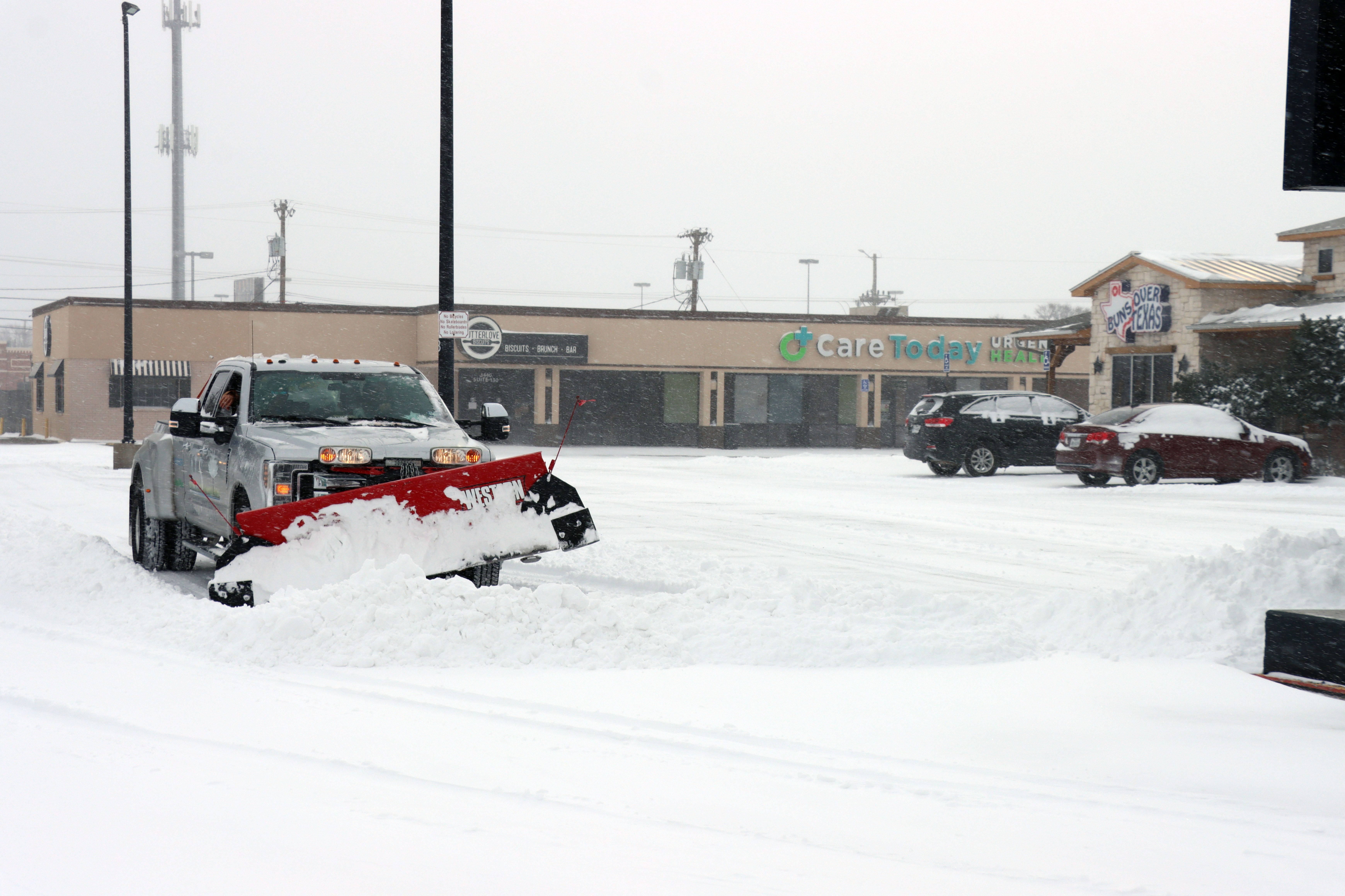 Amarillo Land Services was among the providers working to remove snow from parking lots during Sunday's winter storm.