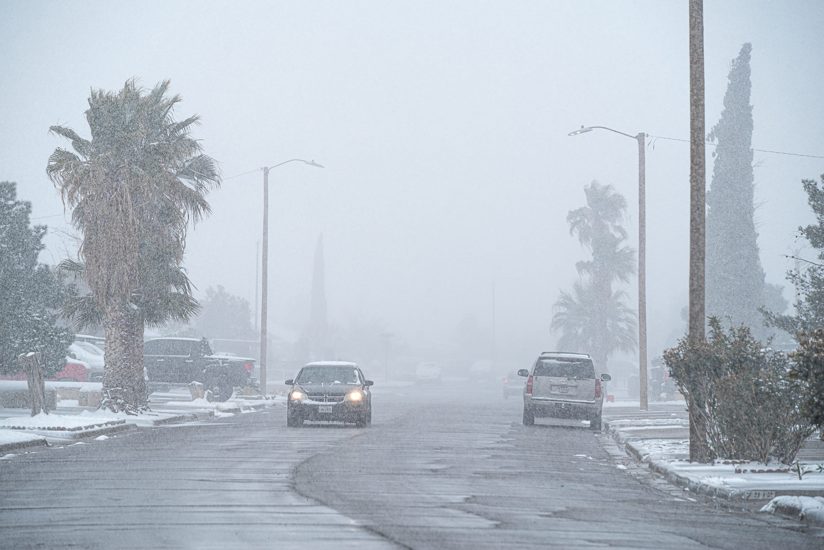 Visibility was low in El Paso's lower valley. Snow fell most of the day in El Paso on Valentine's Day. Feb. 14, 2021.