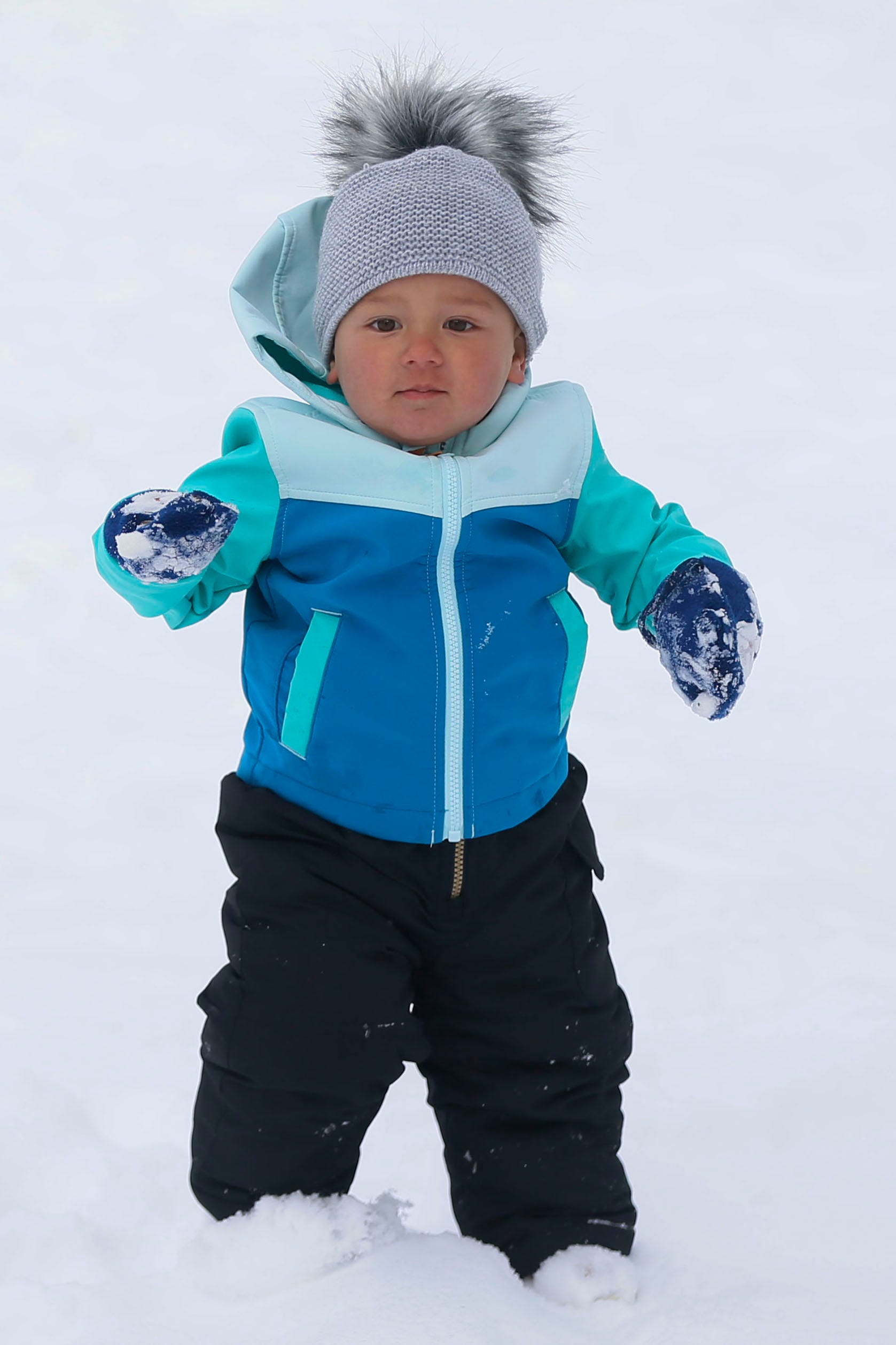 Matyas Selucky enjoys his first time in the snow on Valentine's Day, Sunday, Feb. 14, 2021 at Memorial Park in El Paso.