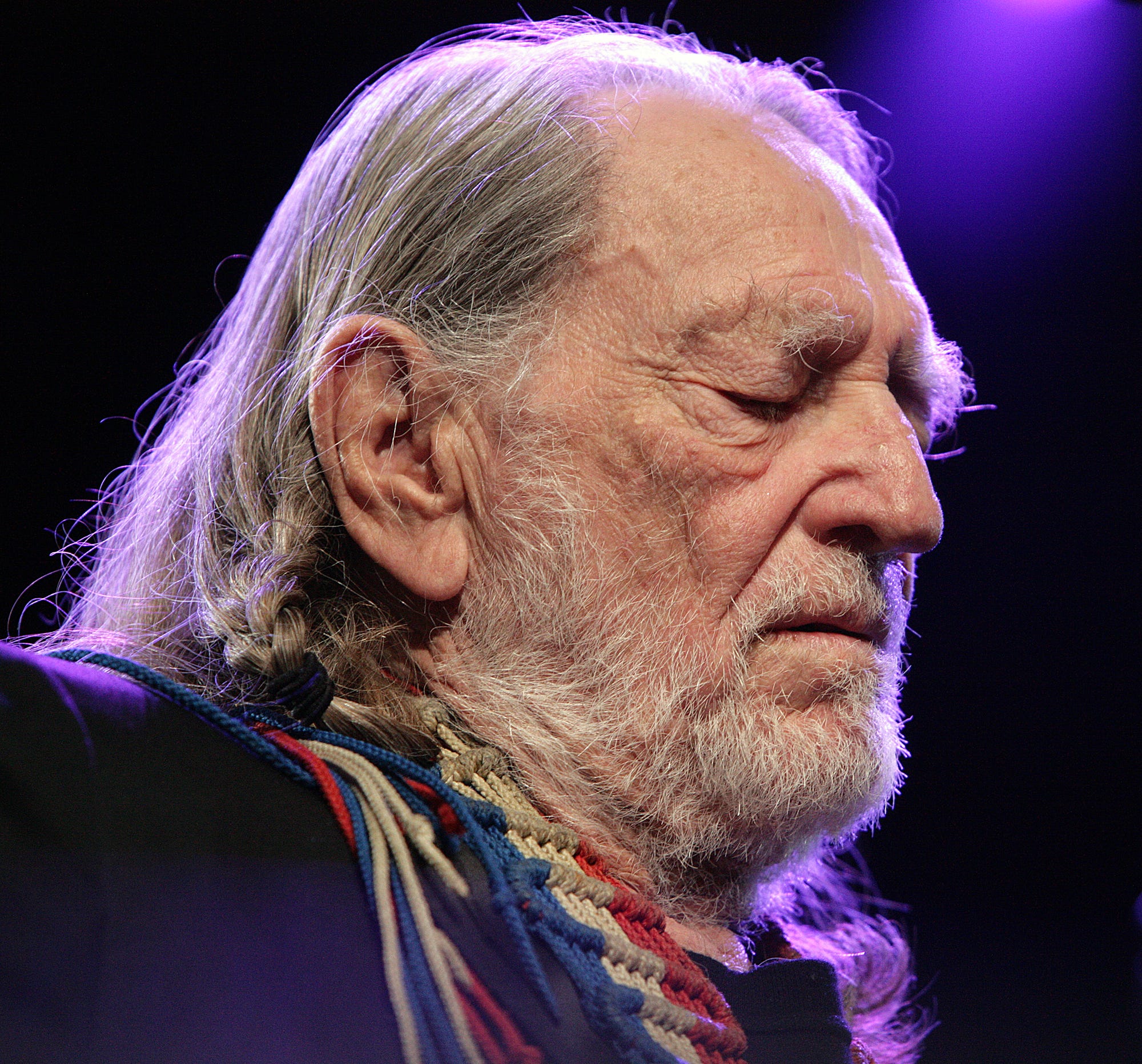 Willie Nelson performs with the Austin Symphony to christen the new Austin City Limits studio at the W Hotel on February 13, 2011.