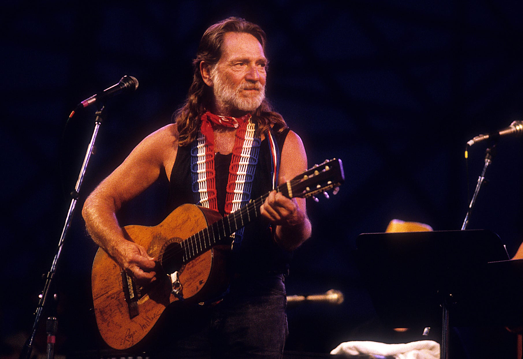 Willie Nelson performs at the Willie Nelson's 4th of July picnic event in Zilker Park on July 4, 1990.