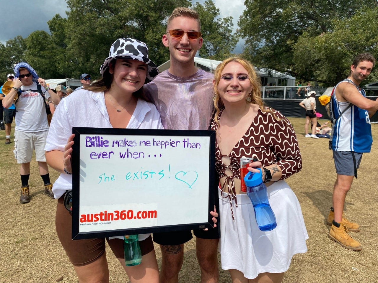 Rayann Vasquez, 20, left, Andrew Carrico, 20, middle, and Gabrielle Harris, 21, waiting for the Billie Eilish show on Saturday Oct. 2, 2021. All three are from Lubbock, Texas.