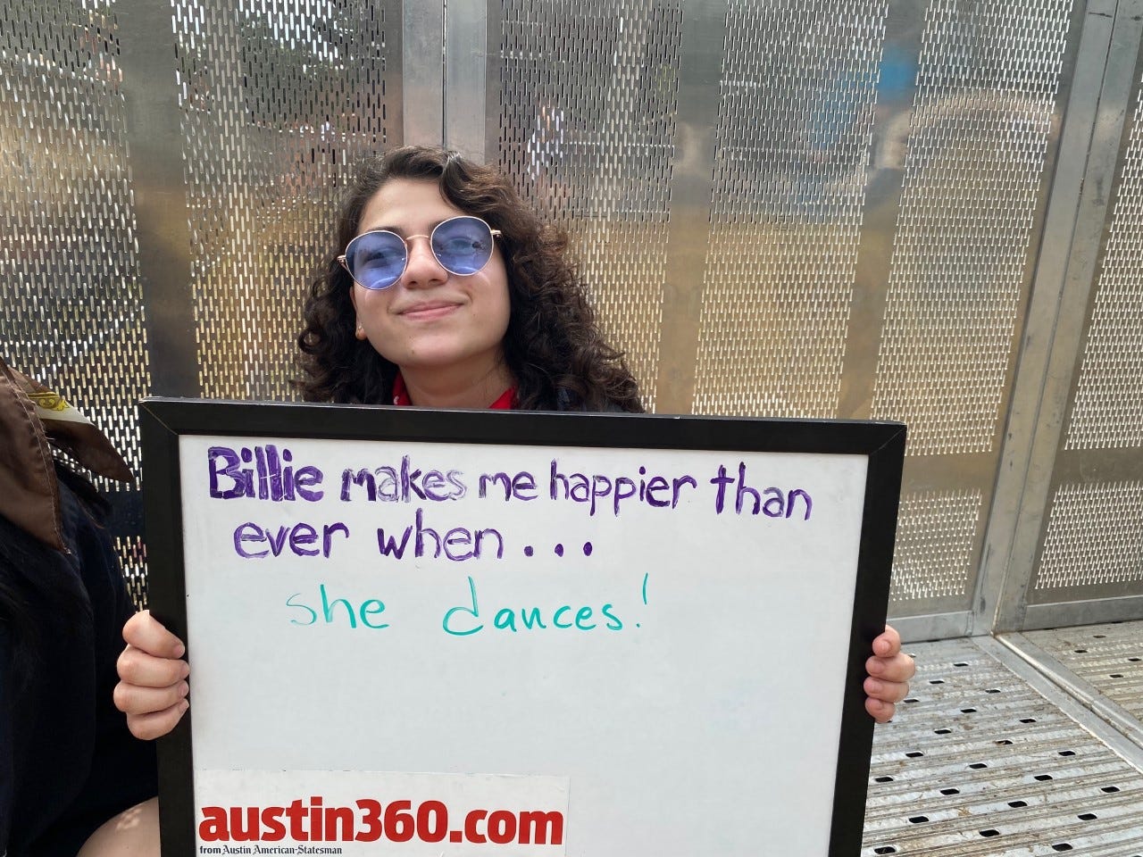 Regina Graells, 21, waiting for the Billie Eilish show on Saturday Oct. 2, 2021. She is from Austin, Texas.