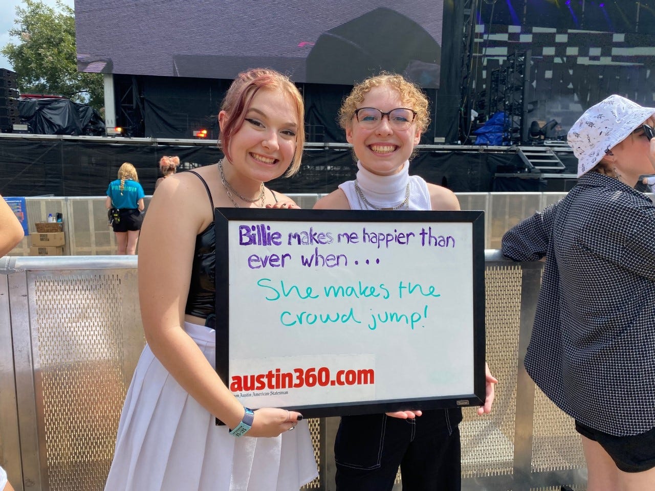 Jenni Long, 17, left, and Delanie Free, 17, waiting for the Billie Eilish show on Saturday Oct. 2, 2021. Both are from Lubbock, Texas.
