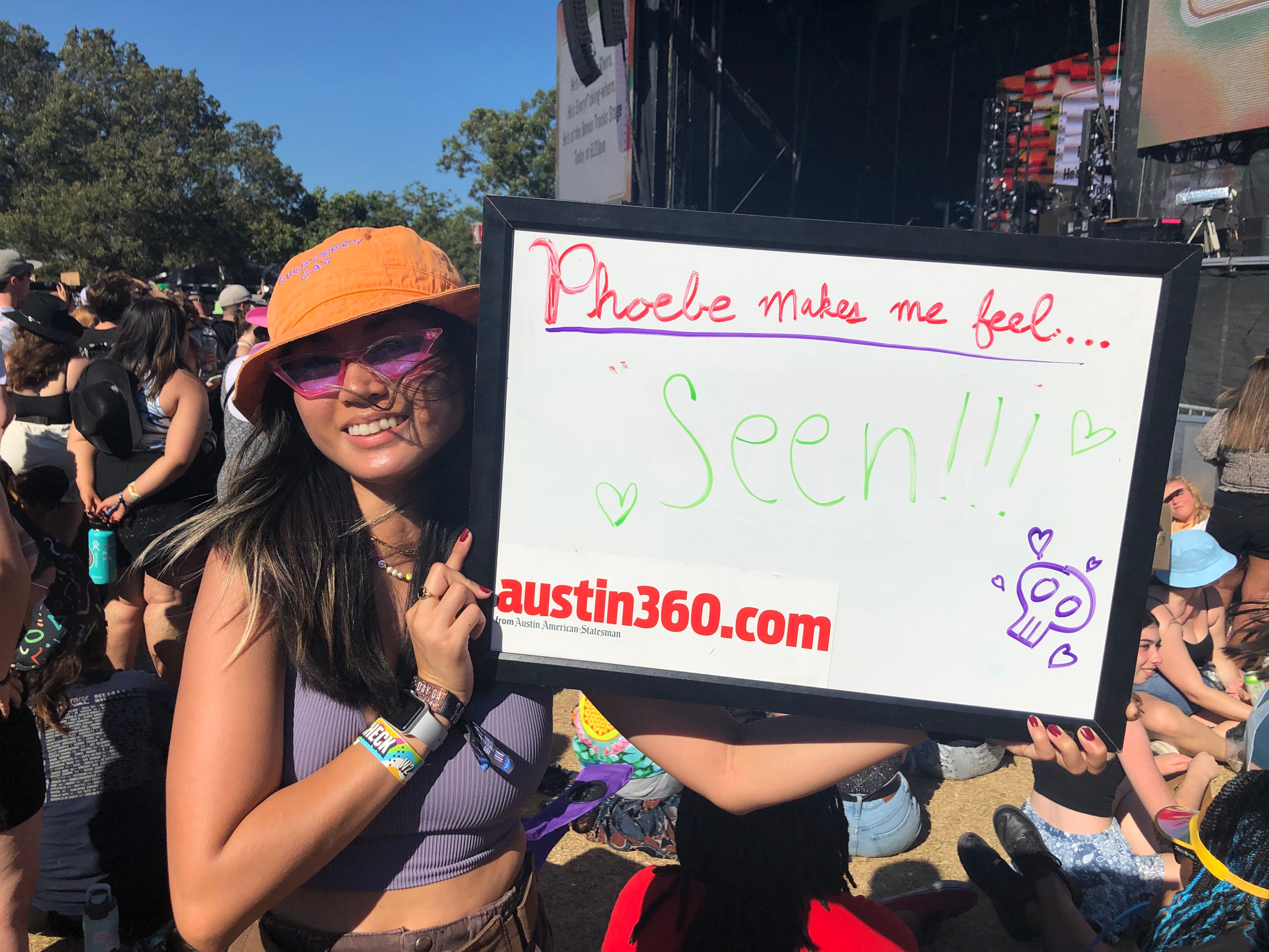 Monica Silverio, 25, of Austin waits for singer-songwriter Phoebe Bridgers to perform during Austin City Limits Music Festival on Oct. 9, 2021.