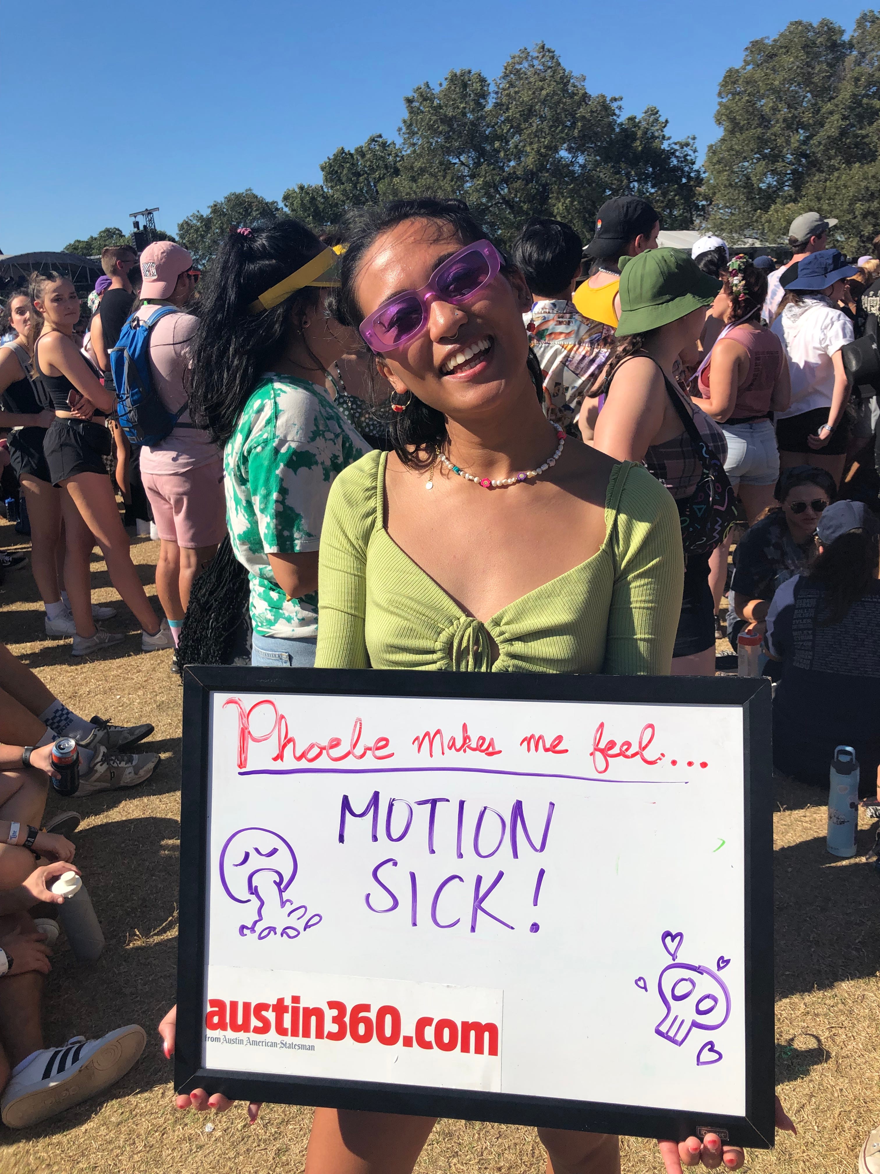 Justine Aquino, 23, of Austin waits for singer-songwriter Phoebe Bridgers to perform during Austin City Limits Music Festival on Oct. 9, 2021.